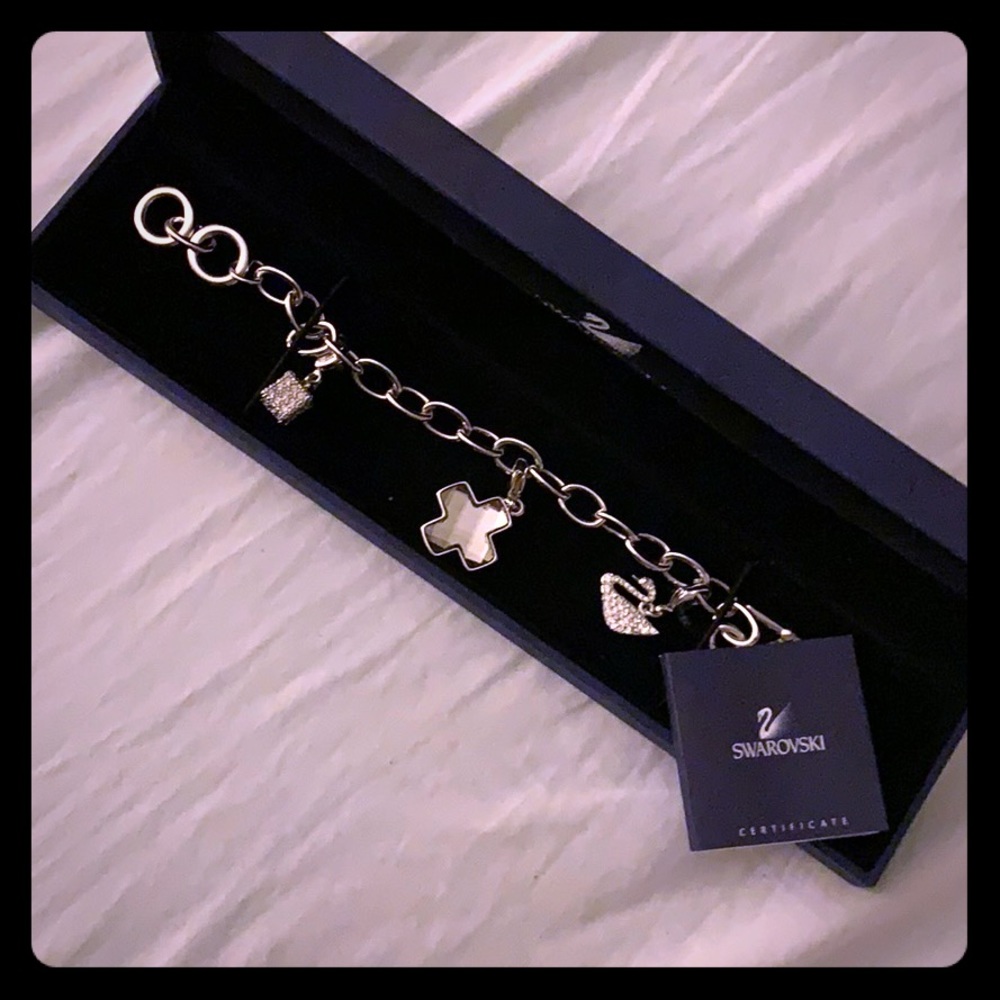 Swarovski charm bracelet , like new!